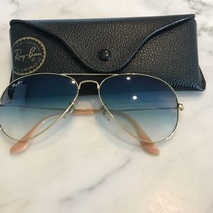 Ray-Ban’s gold frame and blue gradient lens RB3025